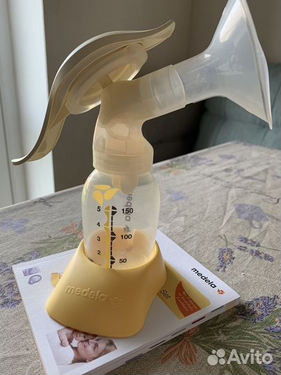 Молокоотсос medela ручной