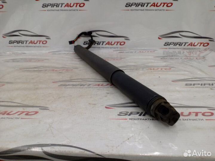 Амортизатор двери багажника задний левый Kia