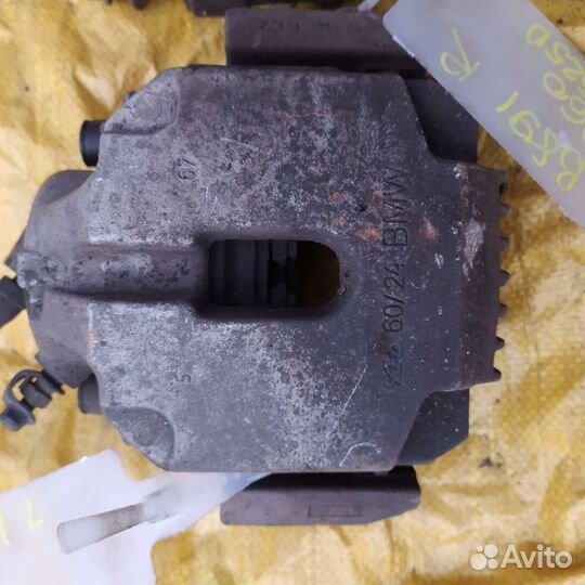 Bmw e60 суппорт передний тормозной