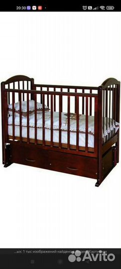 Детская кроватка с маятником и ящиком