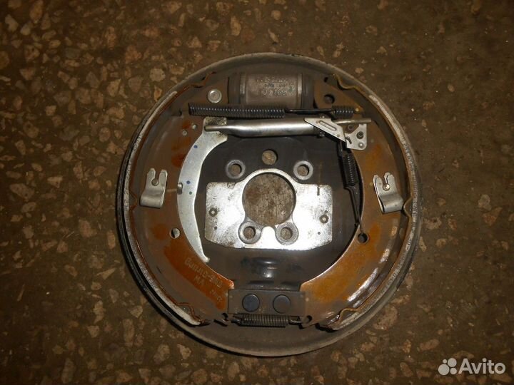 Механизм тормозной задний правый (Skoda Rapid)