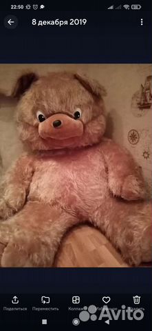 Большой плюшевый медведь