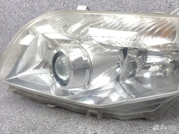 Фара передняя левая Toyota Corolla Fielder ZRE142