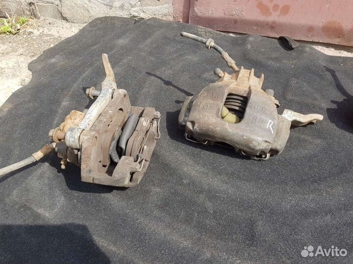 Суппорт тормозной передний Volvo s80