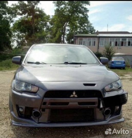 Бампер передний Mitsubishi Lancer X