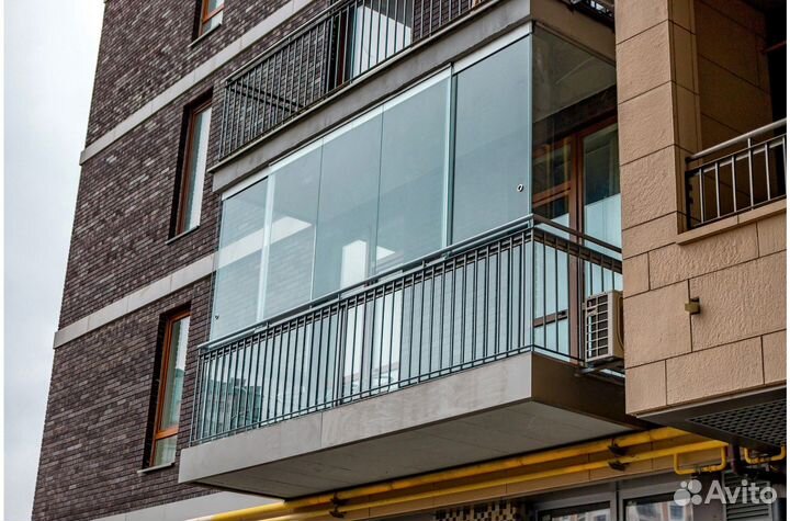 Безрамное остекление домов