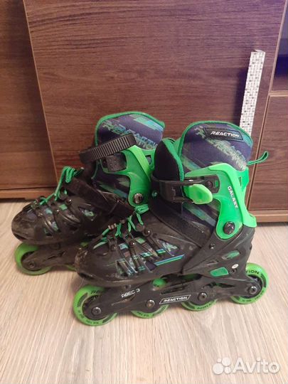 Роликовые коньки