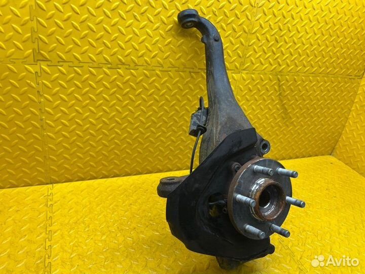 Кулак поворотный передний левый Nissan Navara