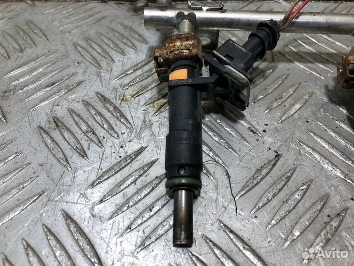 Форсунка двигателя Opel Astra H