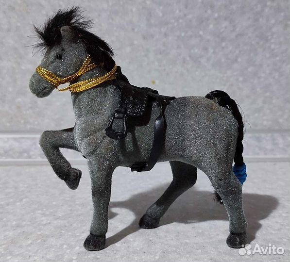 Игрушечная лошадь