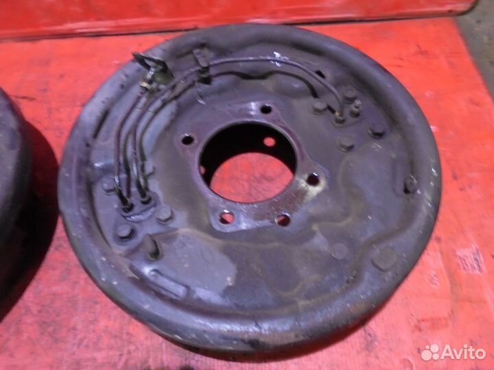 Isuzu ELF Опорный диск с колодками и ртц