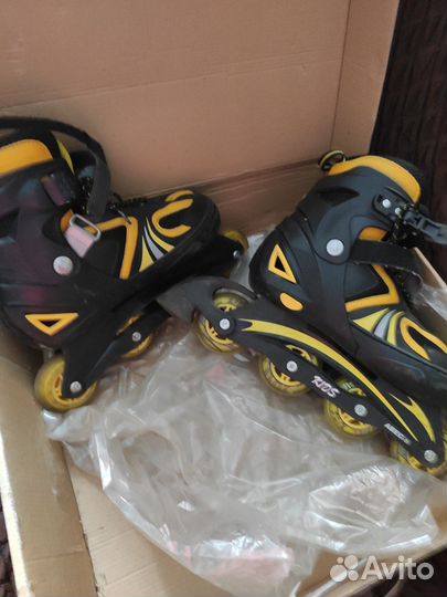 Коньки роликовые