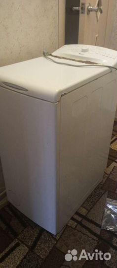 Стиральная машина с вертикальной загрузкой