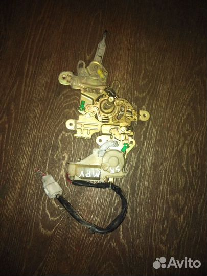 Замок двери Мазда Mazda MPV