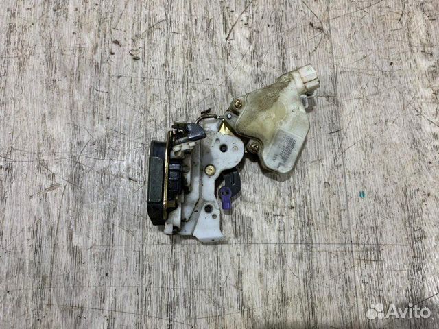 Замок двери задний левый Nissan Almera Classic B10