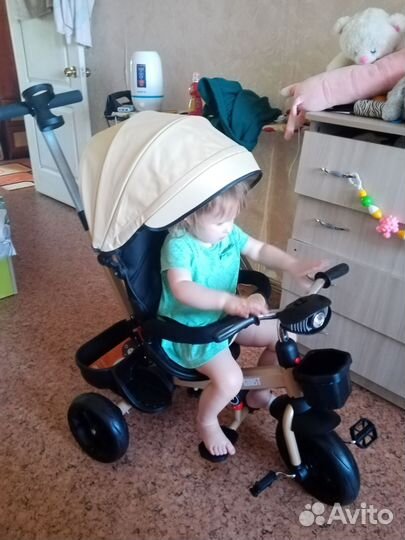 Трехколесный велосипед с ручкой
