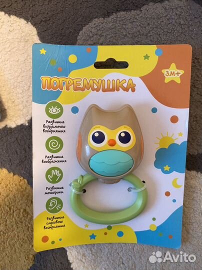 Пакет с новыми детскими игрушками и ниблером