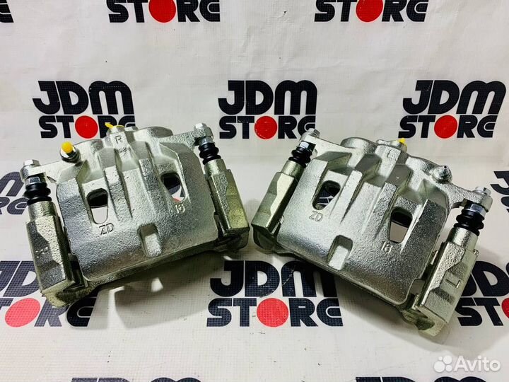 Комплект передних суппортов Camry, Rav4, Alphard