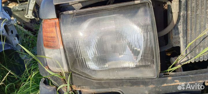 Оптика фары mmc pajero 2