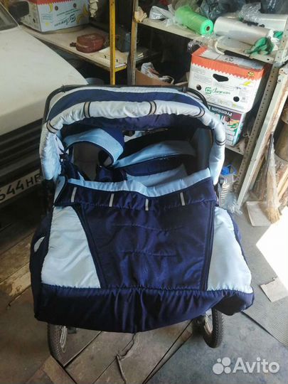 Детская коляска для двойняшек