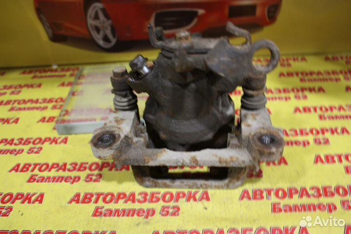 Суппорт тормозной задний правый Mitsubishi Outland