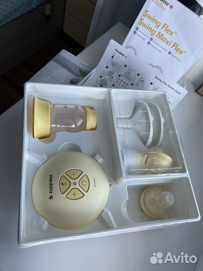 Молокоотсос medela электрический