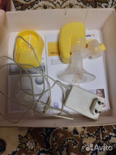 Молокоотсос medela электрический