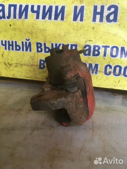 Суппорт тормозной передний левый Mitsubishi Galant