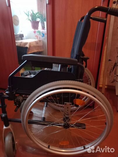 Инвалидная коляска