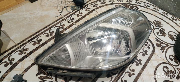 Фара левая Nissan tiida 2013 года