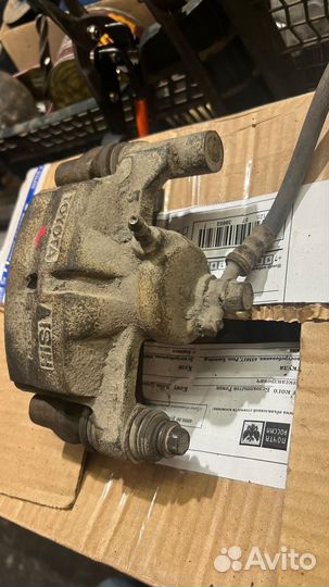 Суппорт задний caldina camry vista