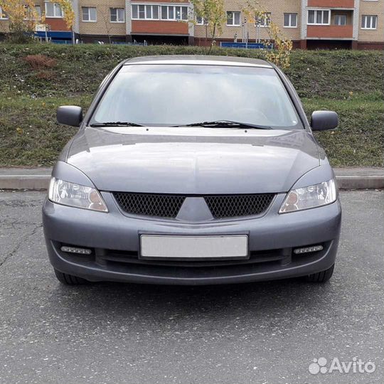 Ресницы передней оптики широкие Митцубиси Лансер 9