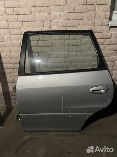 Двери kia carens