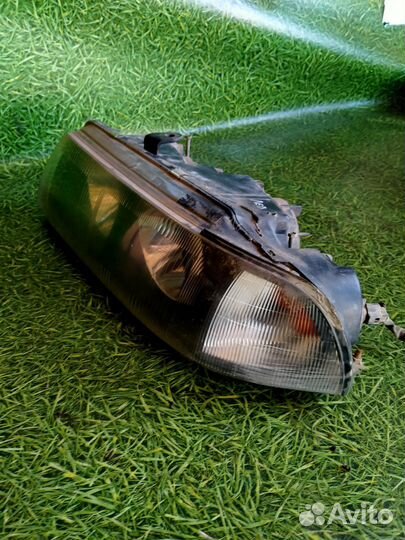 Фара передняя левая для Митсубиси Диамант 3.0л 95г