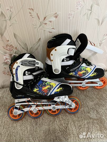 Роликовые коньки