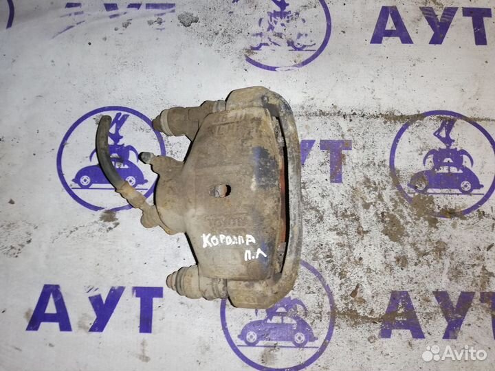 Суппорт передний правый левый Тойота Королла