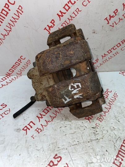 Суппорт тормозной передний левый Ford Escape L3