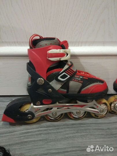 Роликовые коньки