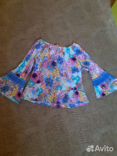 Яркую блузку фирмы cotton kids