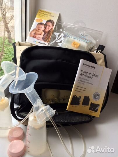 Молокоотсос Medela