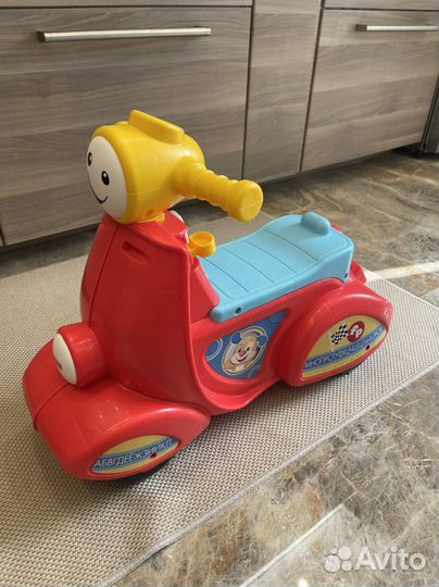 Детский мотоцикл каталка fisher price