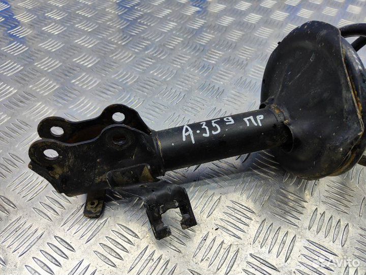 Амортизатор передний правый Nissan Almera N16 1.5