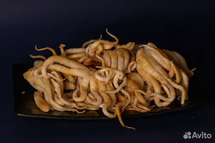 Щупальца кальмара сушеные. Кальмар сушеный