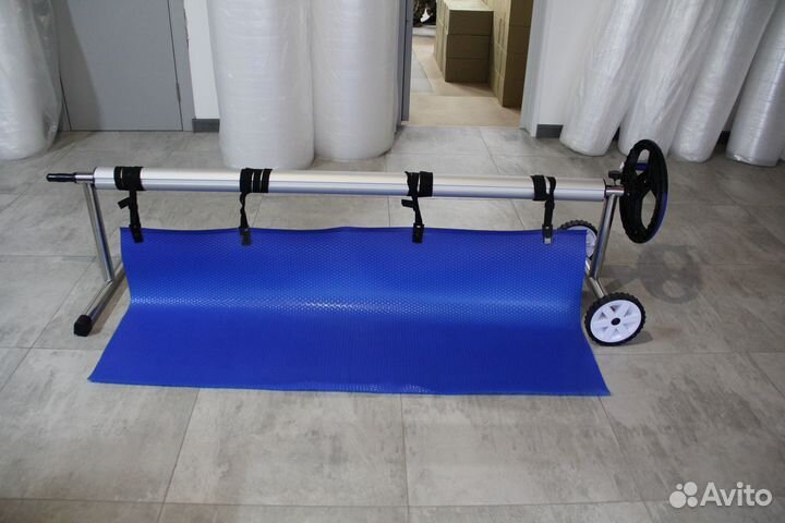 Сматывающее устройство для плавающего покрывала ба