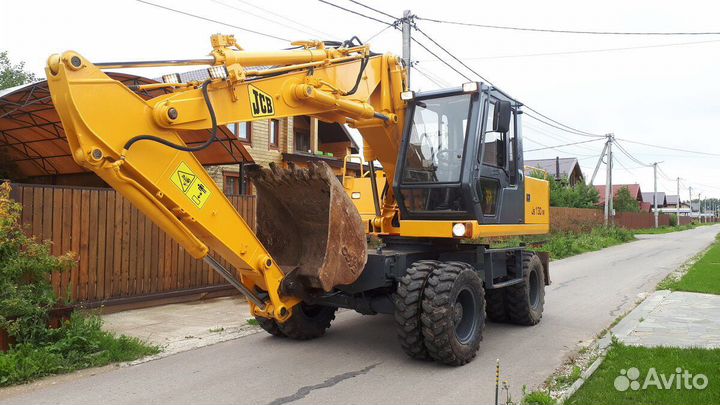 Услуги колесного экскаватора