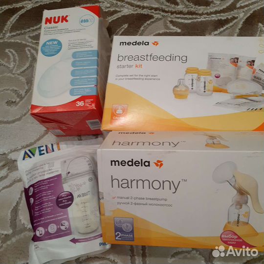 Молокоотсос ручной Medela, бутылочки, пакеты