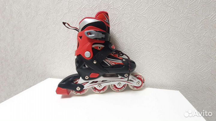 Роликовые коньки