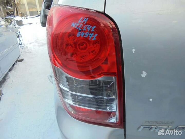 Стоп левый Toyota Corolla Fielder NZE141 1NZ-FE