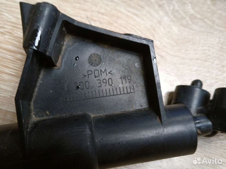 Форсунка омывателя фар левая Volvo S40