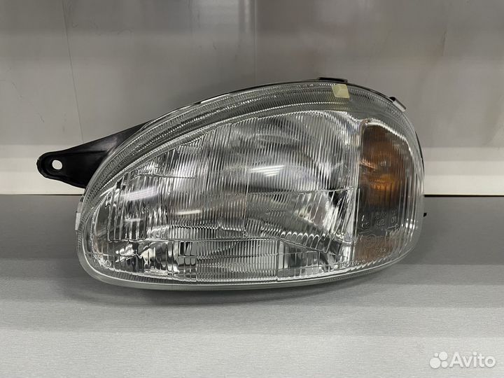Фара левая Opel Corsa 94-99